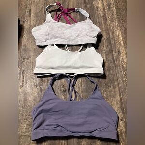 Lot of 3 strappy Lululemon and Born Primitive Sports bras! Size 12 and XL